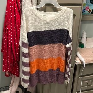 Women’s medium light boutique sweater with bell slit sleeves